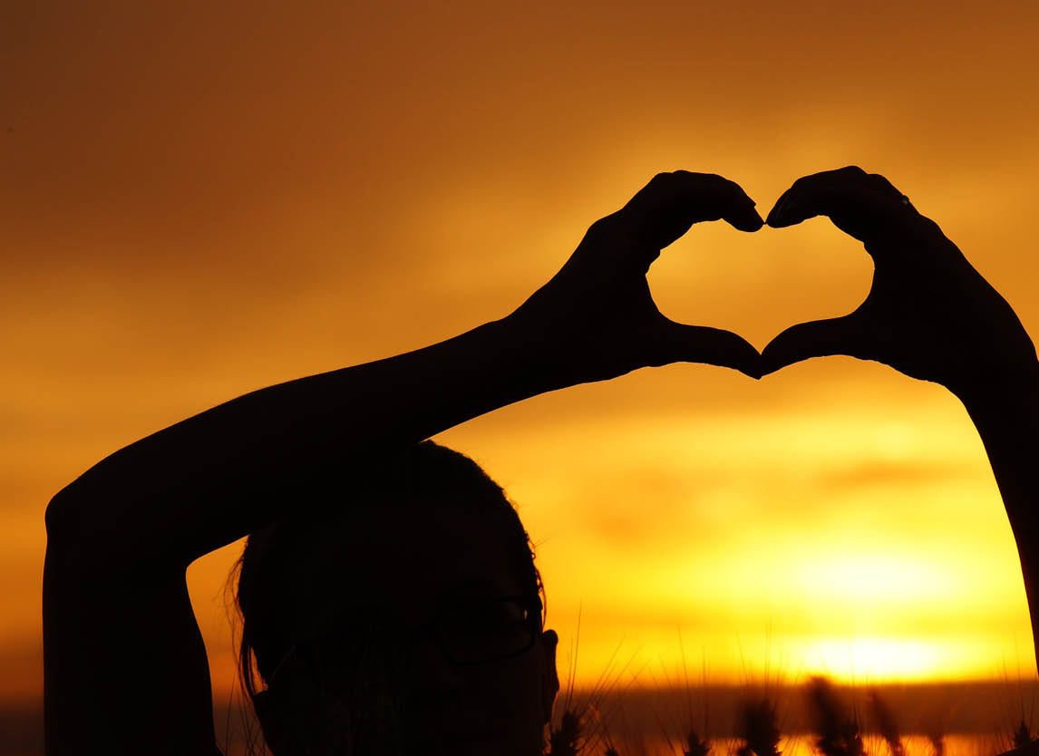 Woman Hands Heart